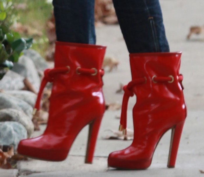 Gwen Stefani in glossy red DSquared2 boots