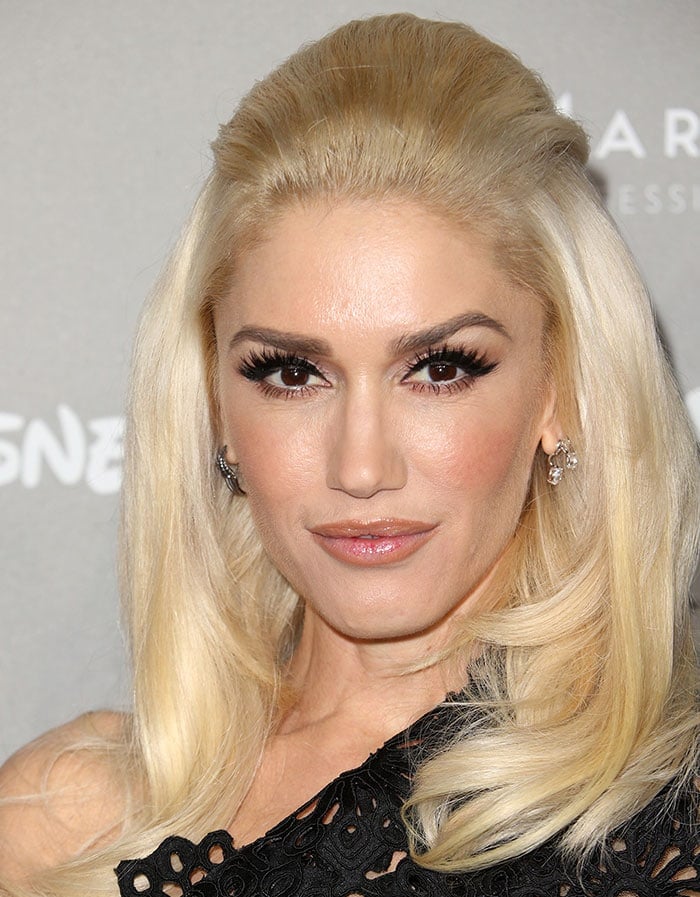 Gwen Stefani wears her platinum blonde hair brushed back at the 2015 Baby2Baby Gala