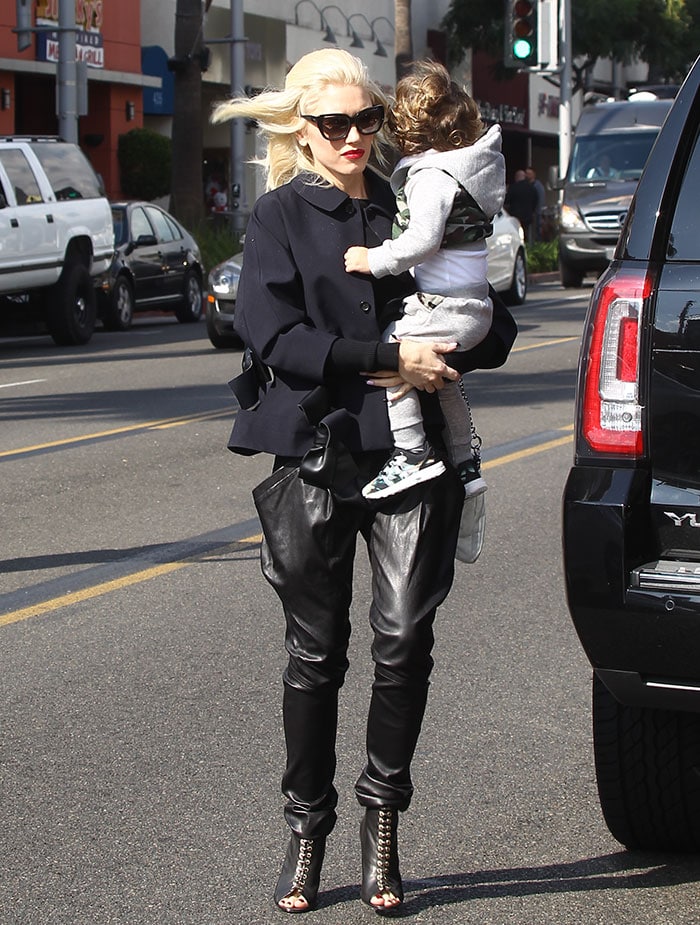 Gwen Stefani holds her son during an outing in Los Angeles