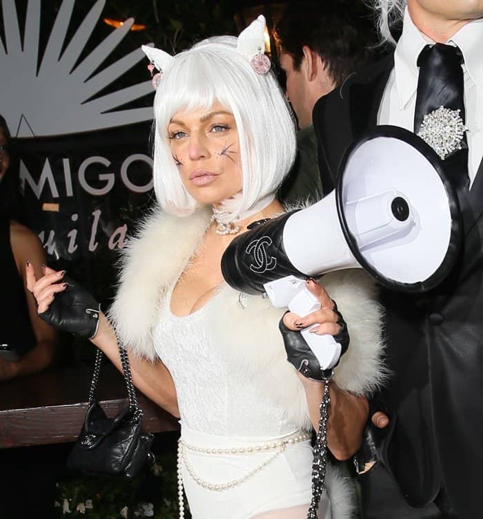 Fergie wore a white bobbed wig, bangs, cat ears, and a white fur stole, brilliantly channeling Choupette