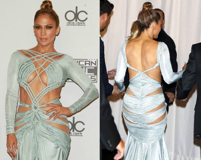 Jennifer Lopez in a daring light blue Nicolas Jebran gown featuring intricate cutouts and a skin-tight design at the American Music Awards