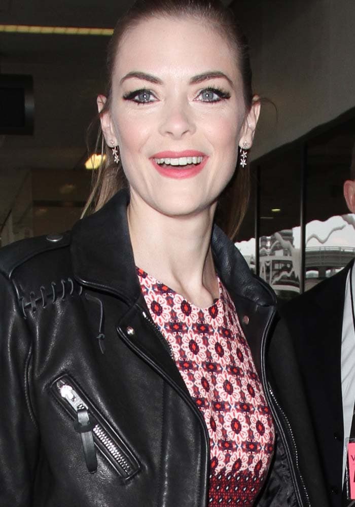 Jaime King wears her hair half-up and half-down at Los Angeles International Airport on November 24, 2015