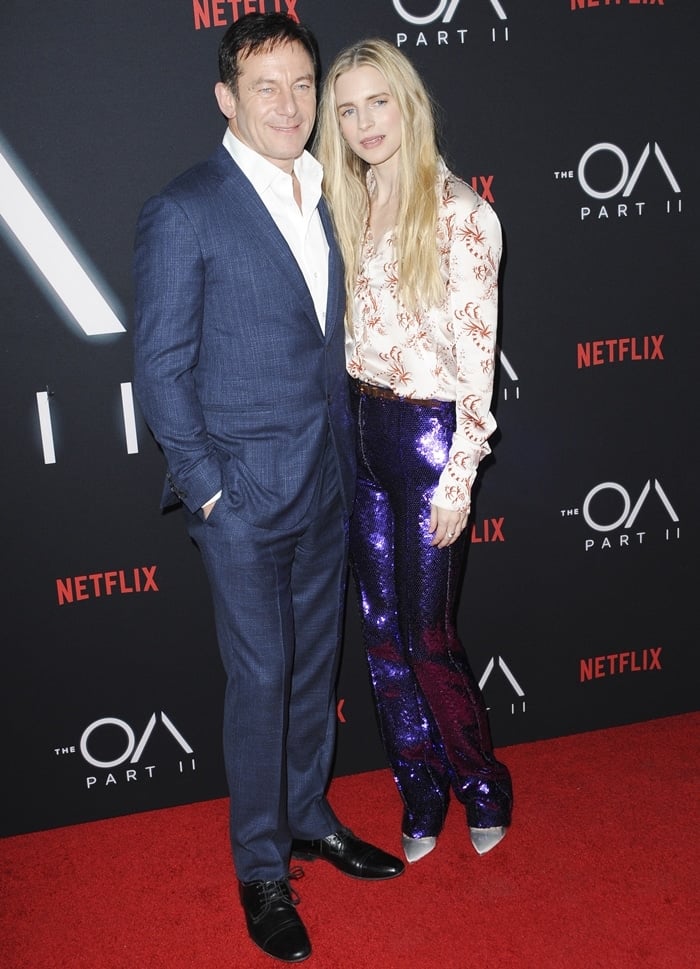 Jason Isaacs (L) and his on-screen wife Brit Marling arrive at the premiere of Netflix's "The OA Part II"