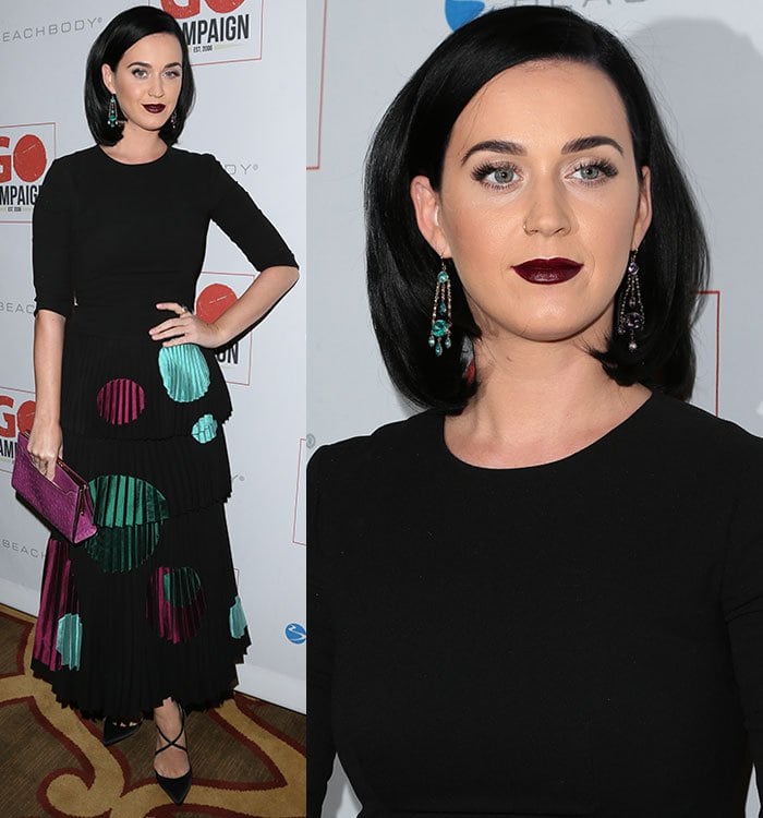 Katy Perry wears a heavy foundation and dark wine-colored lipstick