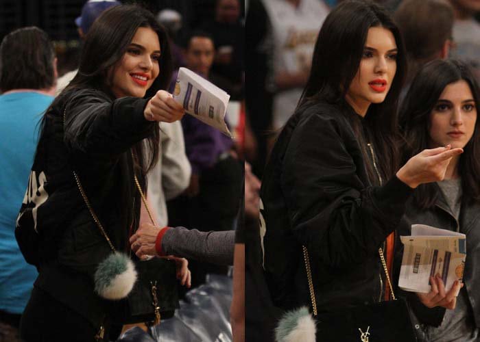 Kendall Jenner tops her ensemble with a Yeezus jacket