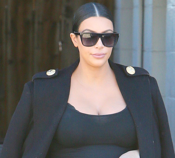 Kim Kardashian was lucky not to suffer a wardrobe malfunction in a versatile Wolford tube dress