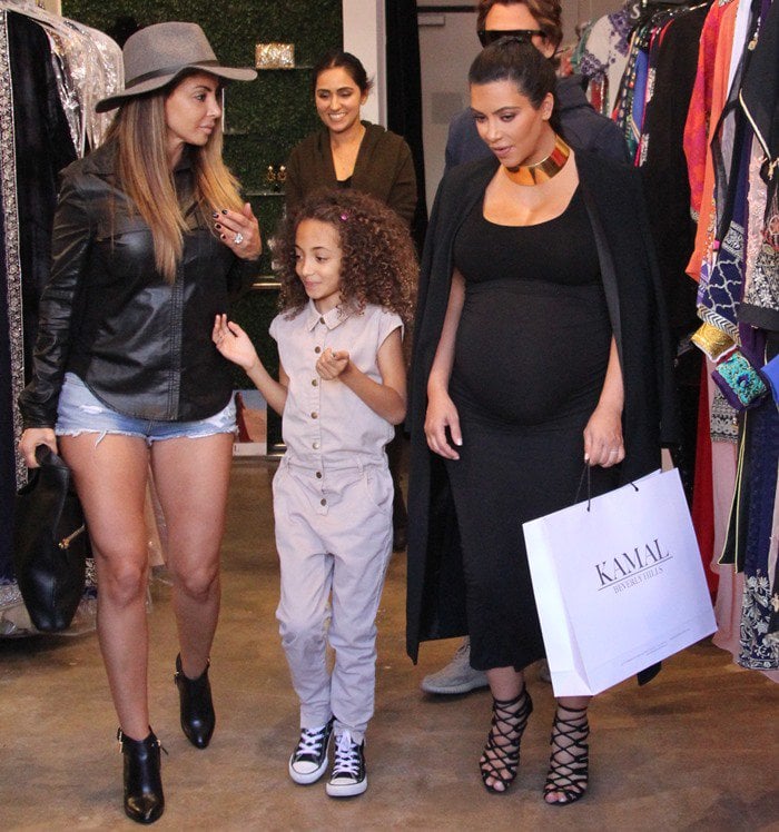 Heavily pregnant Kim Kardashian out shopping at Kamal with Jonathan Cheban and Larsa Pippen in Beverly Hills on November 9, 2015