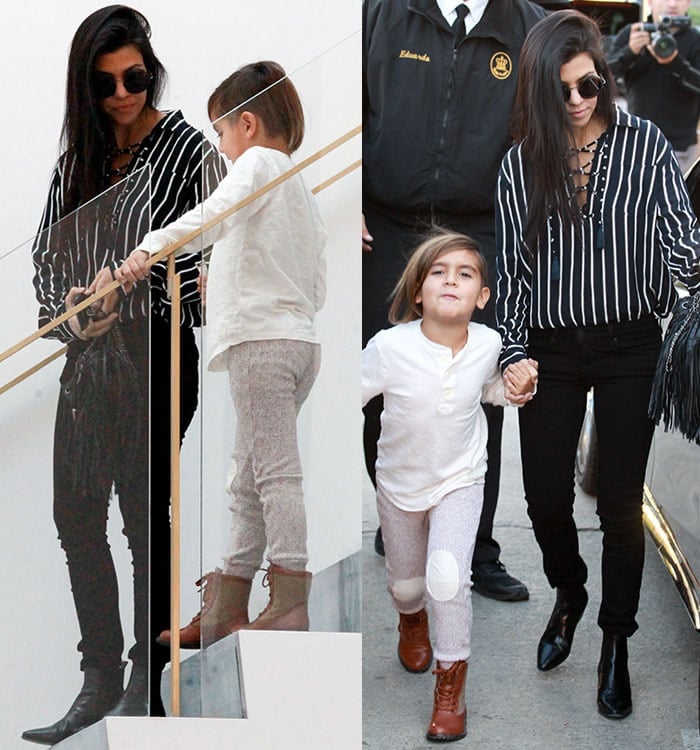 Kourtney Kardashian rocking a loose-fitting black-and-white striped lace-up blouse with tassel details by Faithfull the Brand