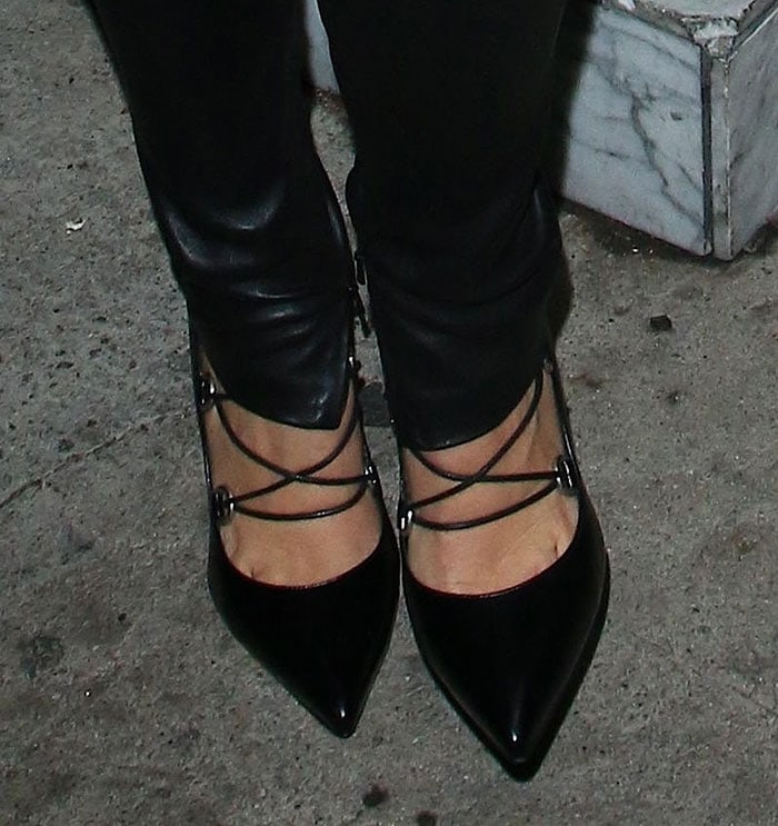 Kourtney Kardashian's feet in Saint Laurent pumps