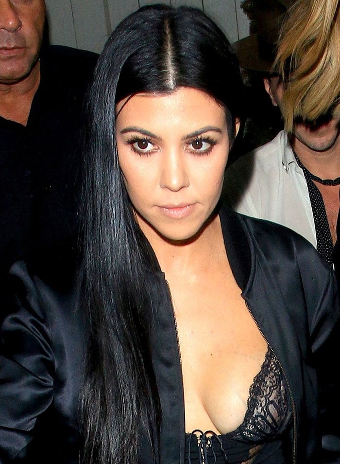 Kourtney Kardashian wears her hair down as she attends sister Kendall Jenner's birthday celebration