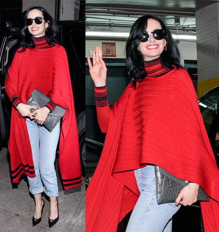 Krysten Ritter wears a red poncho while paying a visit to Huffington Post
