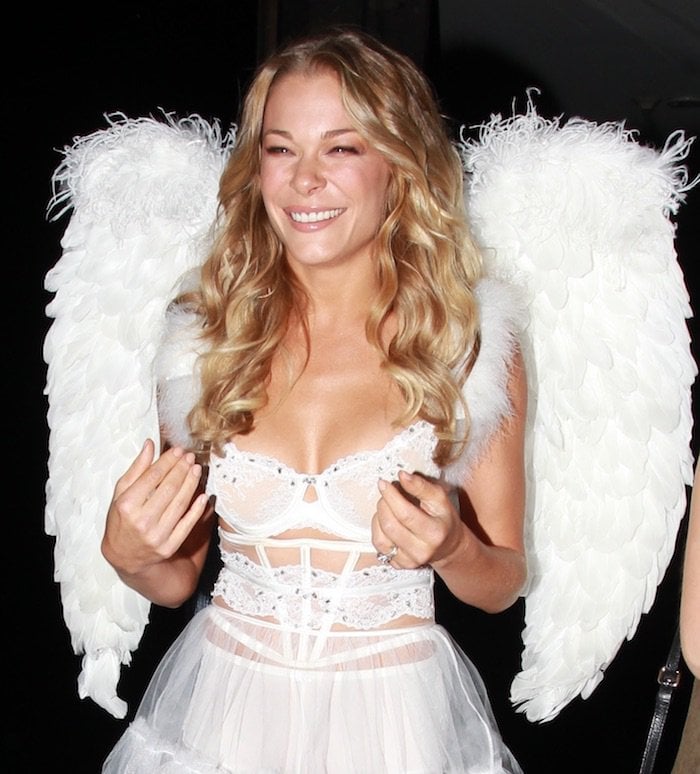 LeAnn Rimes wears her blonde curls down at a Halloween bash in Hollywood