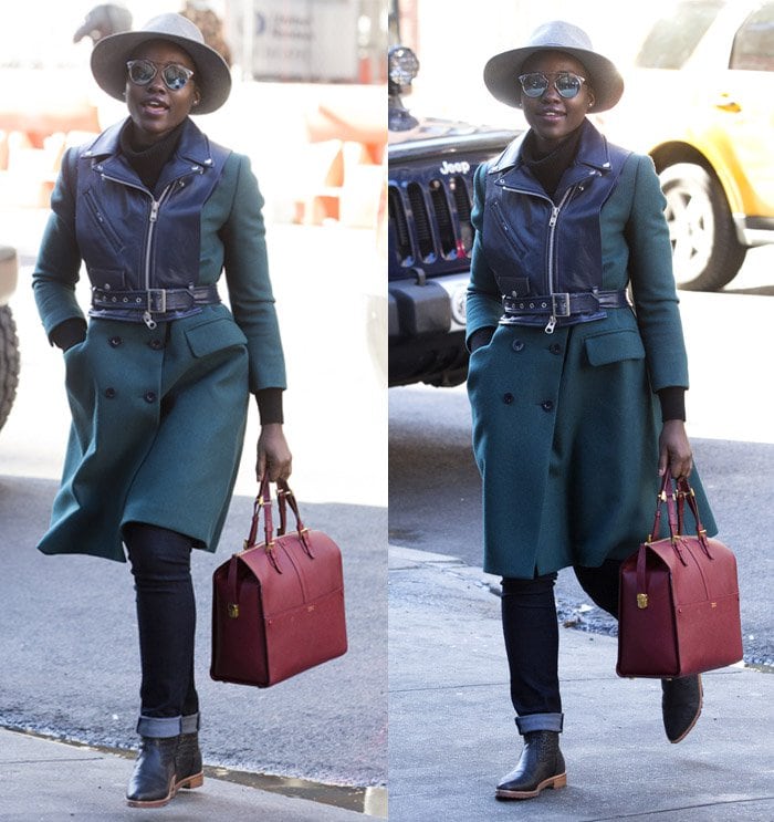 Lupita Nyong’o carries a red leather Giorgio Armani Borgonuovo bag