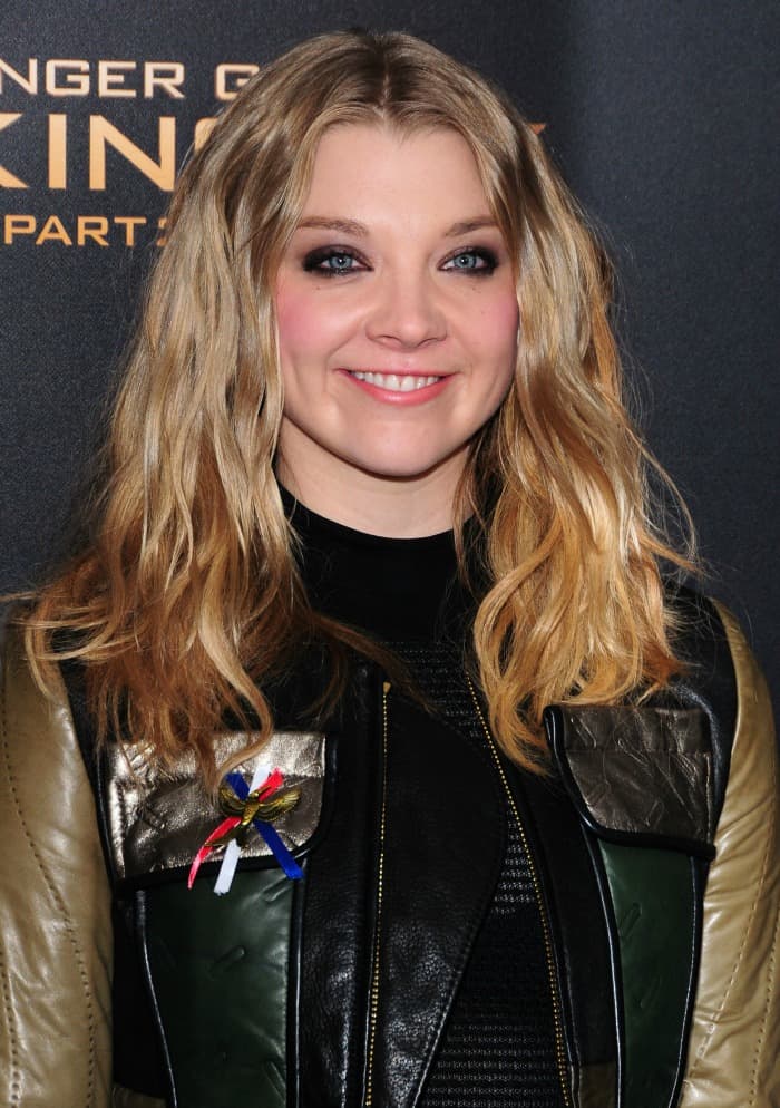 Natalie Dormer's multi-colored leather jacket and mesh high-collared black top
