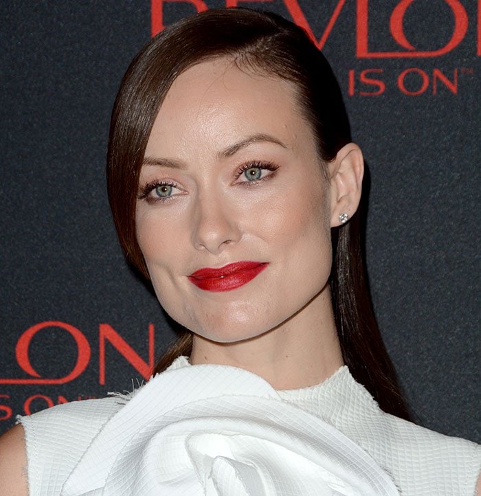 Olivia Wilde with a sleek side part hairstyle