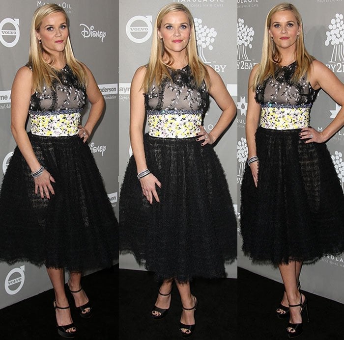 Reese Witherspoon poses for photos in a Giambattista Valli dress at the Baby2Baby Gala