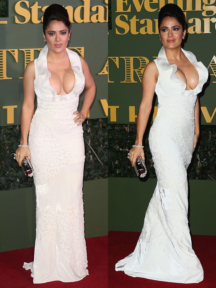 Salma Hayek dazzles in a curve-hugging white Alexander McQueen gown with a plunging neckline and intricate detailing at the 2015 Evening Standard Theatre Awards