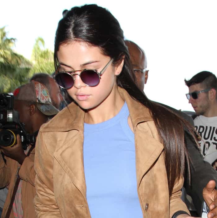Selena Gomez rocks Simon Miller x Moscot “001” sunglasses at Los Angeles International Airport