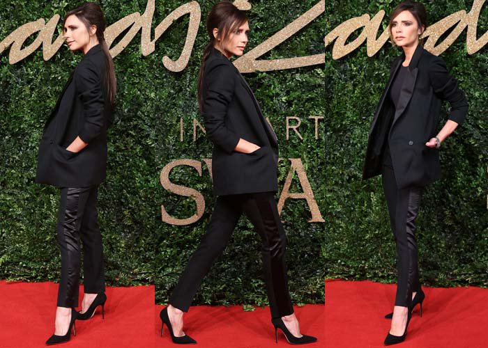 Victoria Beckham wears a blazer-and-pants combination from her own line