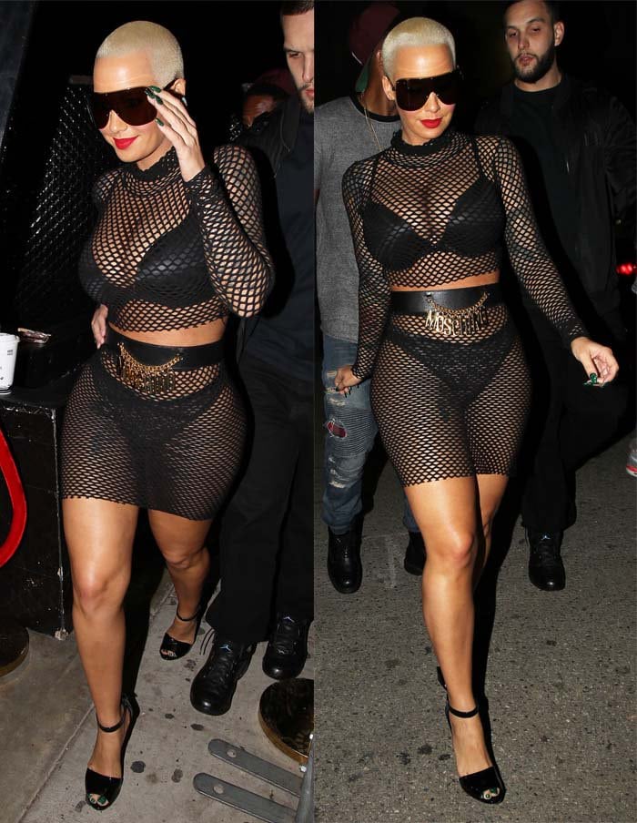 Amber Rose fit in with the ladies at Ace of Diamonds in a fishnet top and skirt