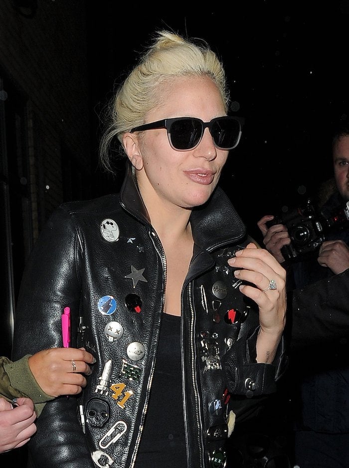 Lady Gaga wears her bleached blonde hair up as she leaves a London recording studio
