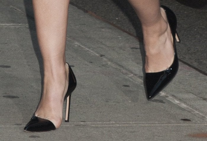 Melissa Benoist shows off her sleek style in glossy black Brian Atwood d’Orsay pumps with pointed toes and stiletto heels