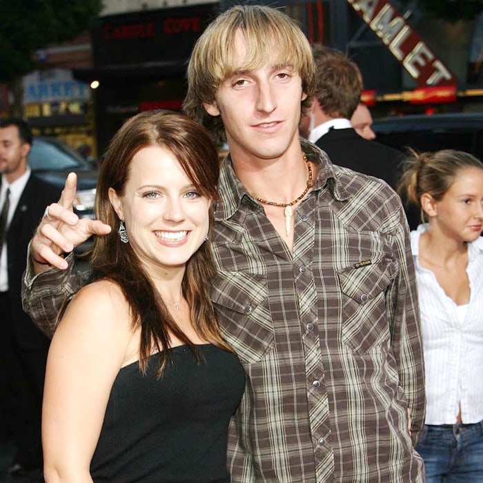 Actress Allison Munn poses with her brother, Russell Clark Munn Jr., at the Los Angeles premiere of Warner Bros.' Exorcist: The Beginning on August 18, 2004, at the Chinese Theater
