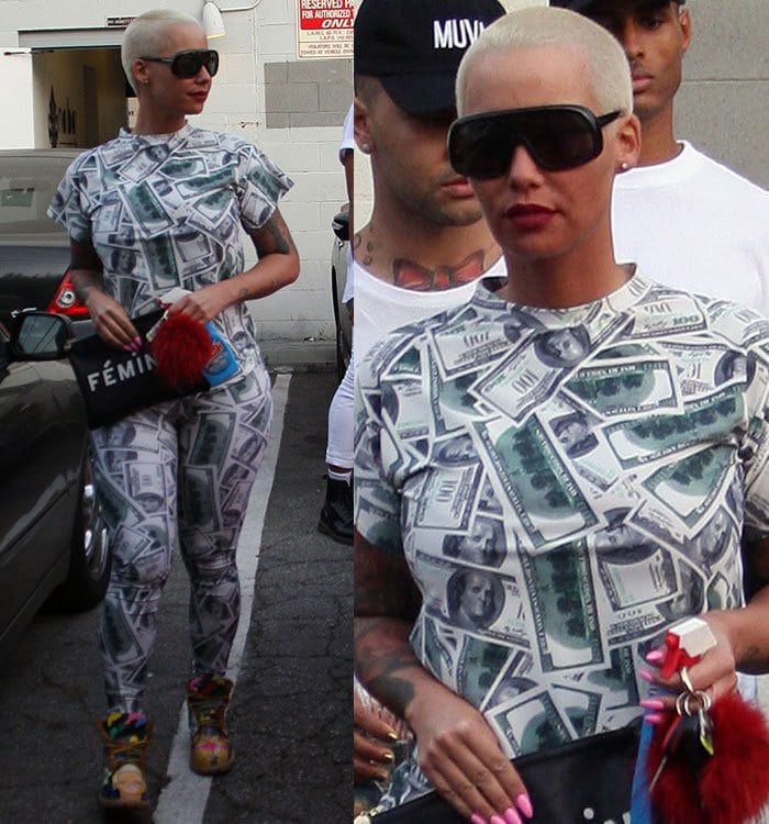 Amber Rose sports her trademark close-shaved blonde hair while leaving a nail salon