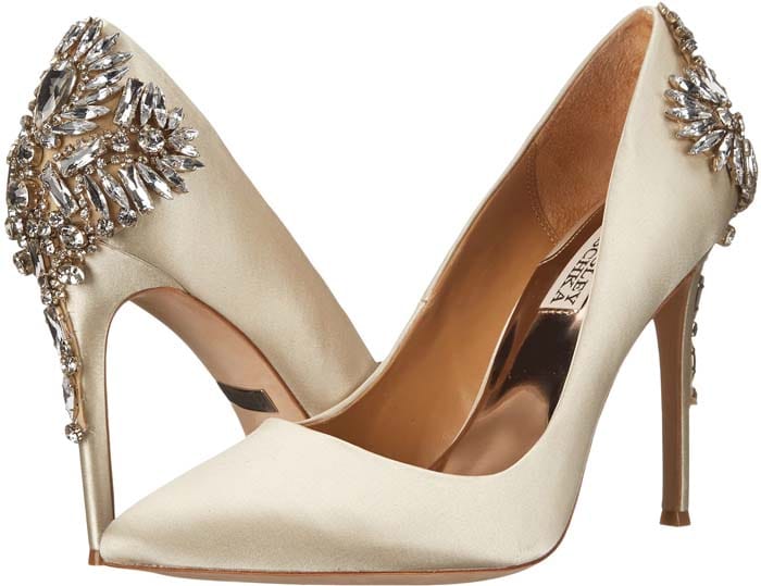 A shimmering crystal cluster wraps the heel cap of Badgley Mischka's glamorous satin Poetry pumps