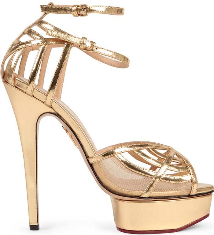 Charlotte Olympia spins her signature web in golden leather to make the Octavia ankle-strap sandal a high-shine icon