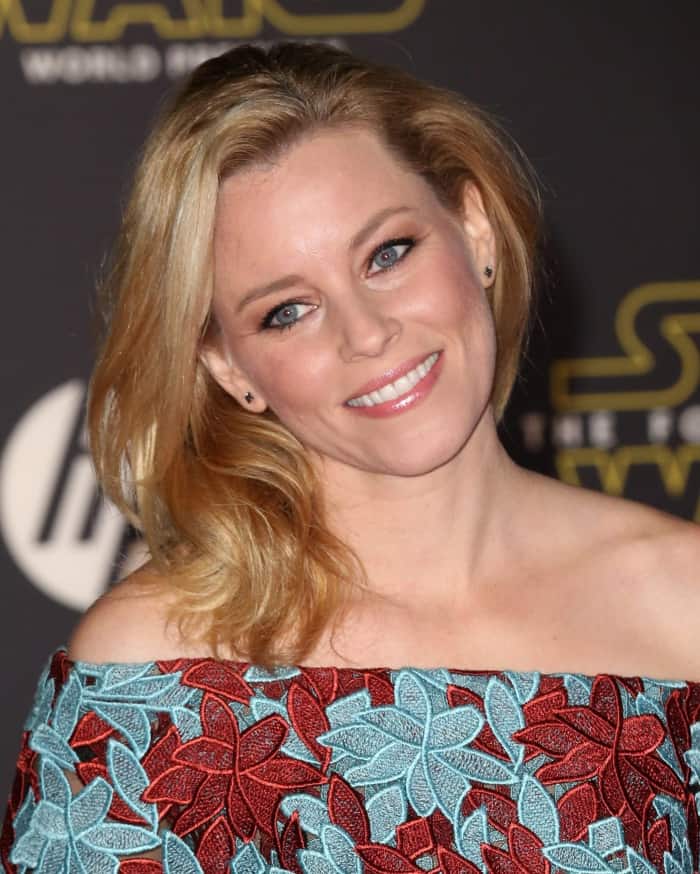 The shoulder-baring neckline of her floral Elie Saab gown accentuated Elizabeth Banks' face