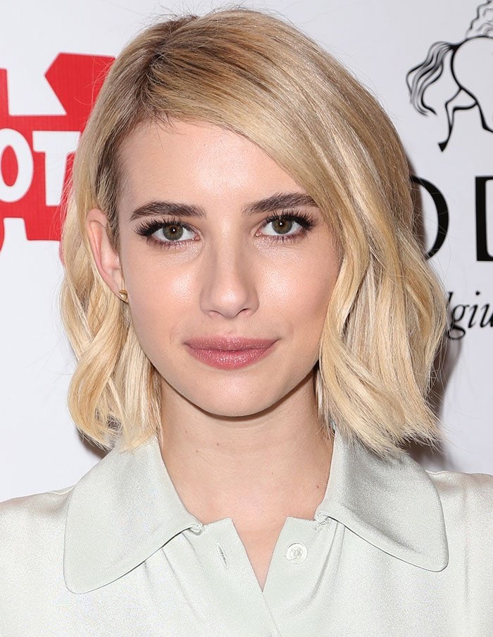 Emma Roberts wears her hair down at Godiva's "Hot Cocoa for a Cause" kick-off