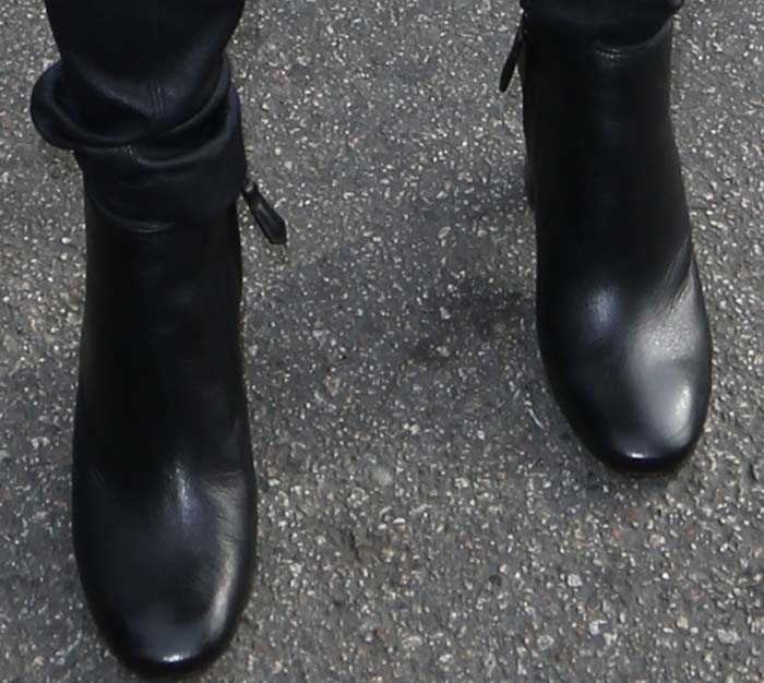Emmy Rossum's feet in Prada boots