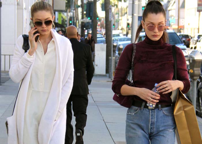 Sisters Bella and Gigi Hadid go clothes shopping at Yves Saint