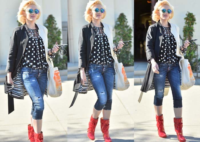 Gwen Stefani wears a polka-dot blouse with ripped jeans and sunglasses for a church visit