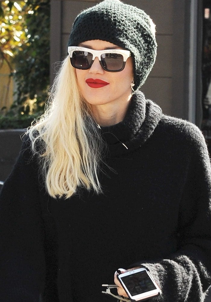 No Doubt's lead vocalist Gwen Stefani wears a beanie over her hair