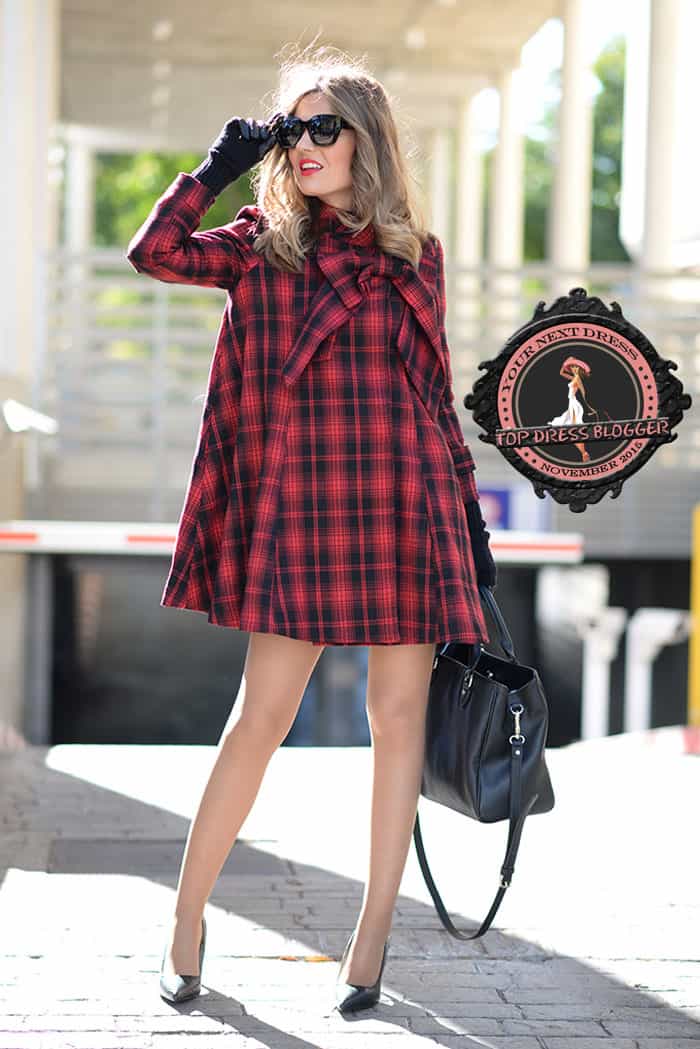 Helen's swing-style plaid dress and black pumps