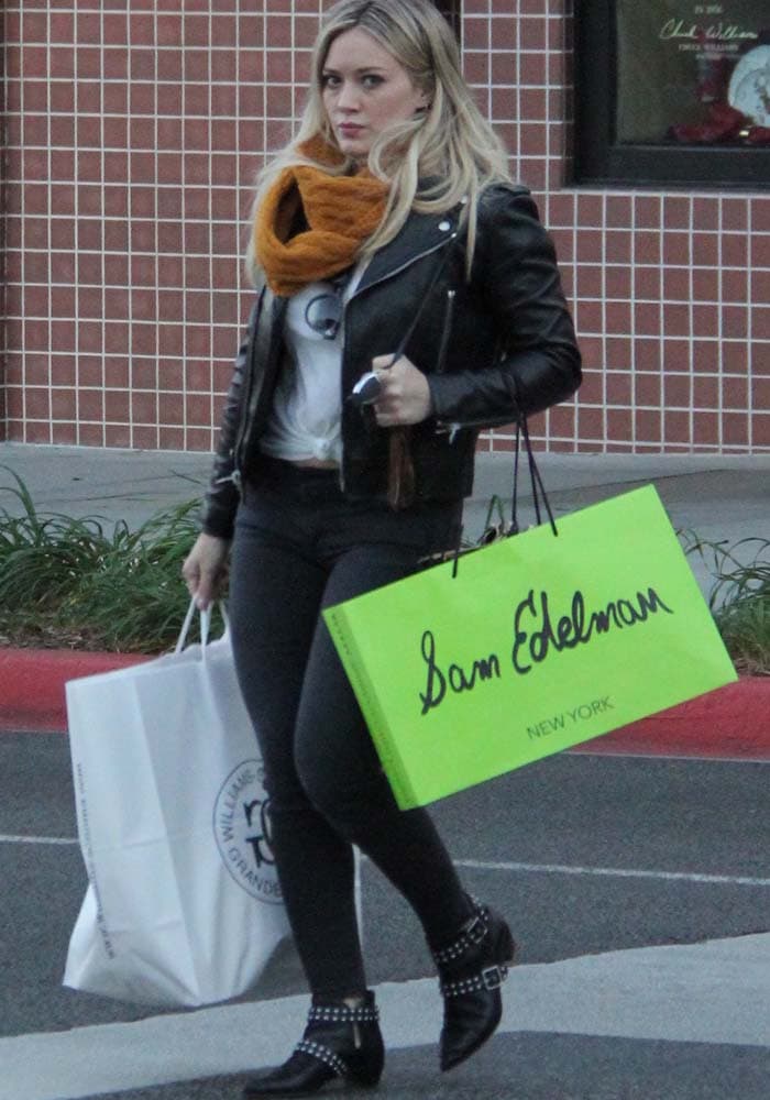 Hilary Duff carries shopping bags from Williams-Sonoma and Sam Edelman while out in Beverly Hills