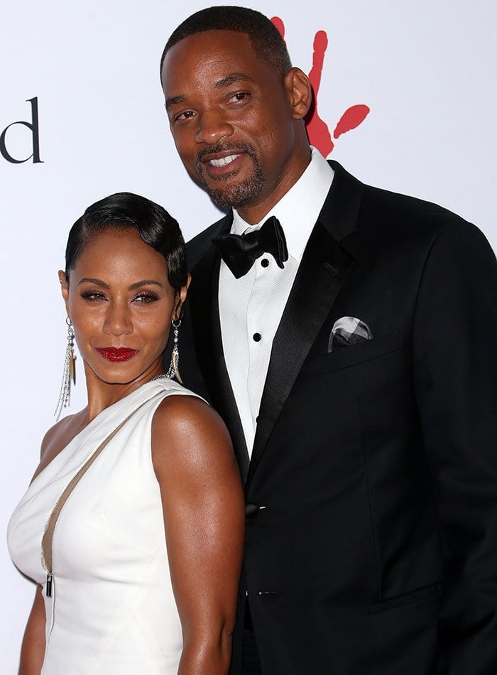 Jada Pinkett Smith and Will Smith pose together on the red carpet