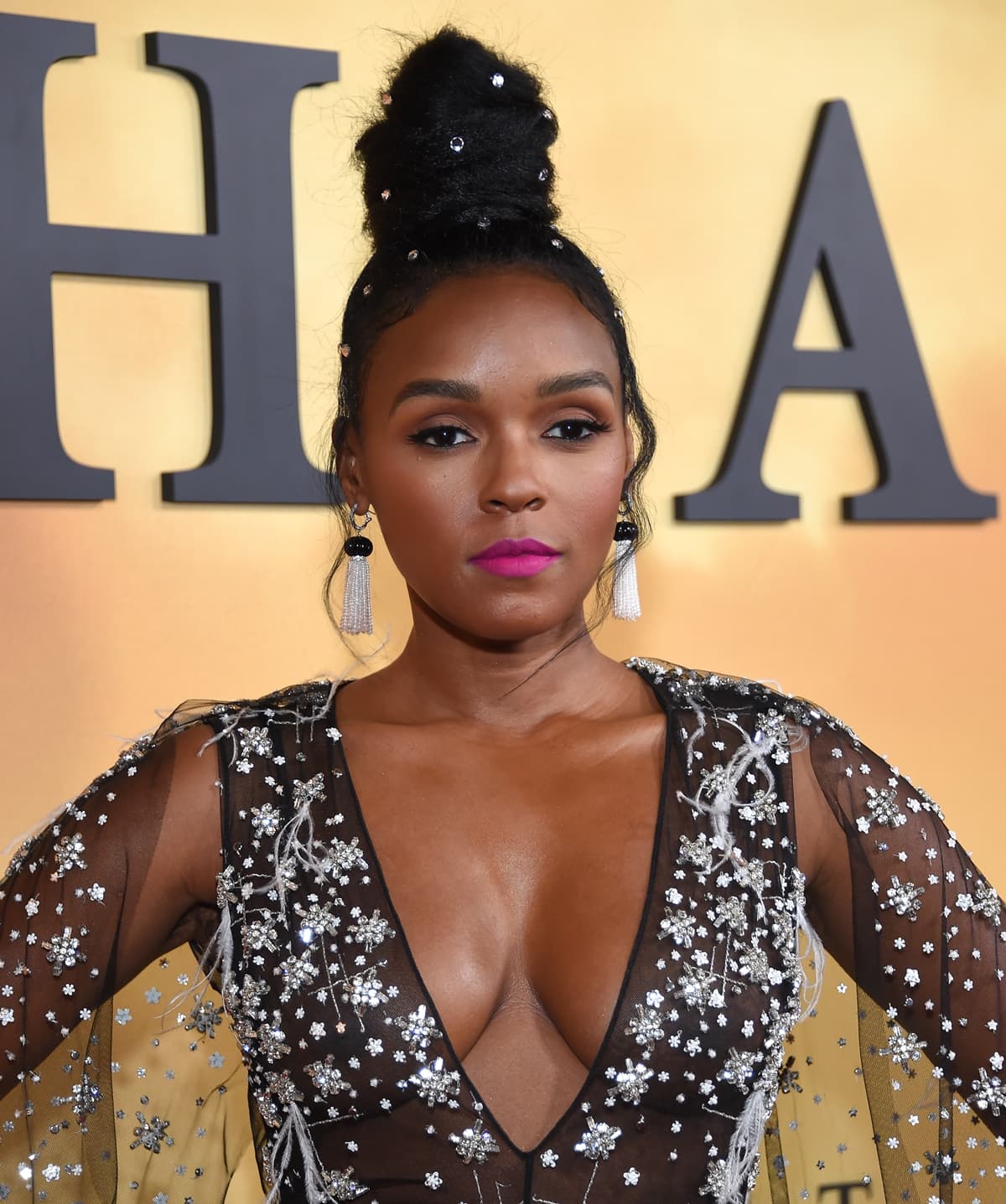 Janelle Monáe in an embellished Honayda dress and Goshwara tassel earrings at the premiere of "Harriet"