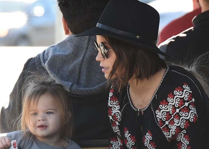 Everly Dewan-Tatum and Jenna Dewan-Tatum ride a train at the farmers market