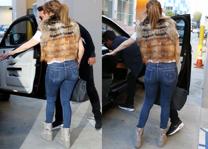 Jennifer Lopez wears a pair of Rag & Bone jeans and Yeezy boots while shopping in Beverly Hills