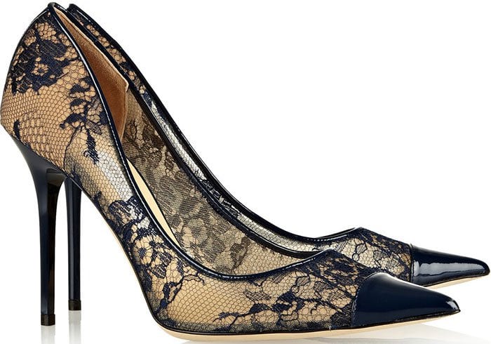 Dainty lace heightens the romance of a timeless single-sole pump polished with a patent leather cap toe