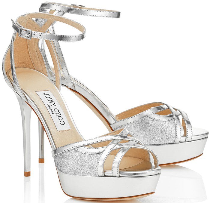 Metallic leather and scintillating sequins style a chic platform sandal set on a sky-high heel