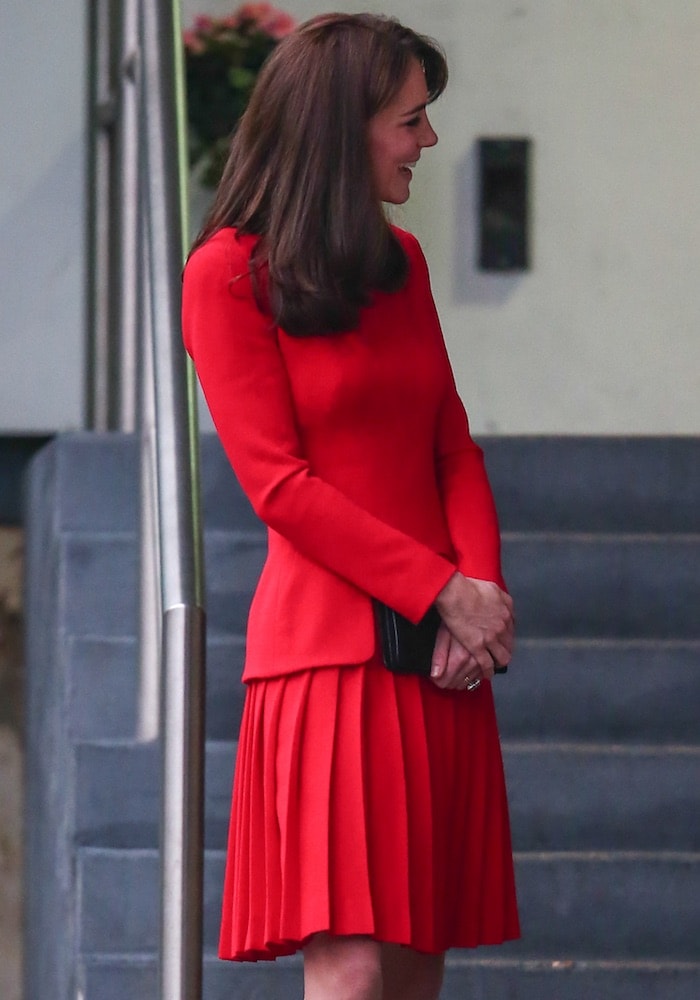 Kate Middleton wears her hair down as she attends a Christmas party at the Anna Freud Centre