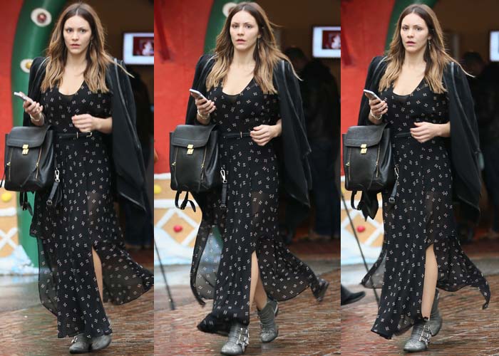 Katharine McPhee in a sheer maxi dress with a side slit underneath a black hoodie