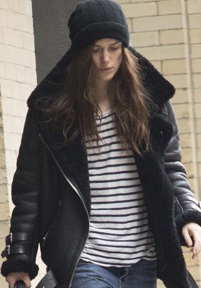 Keira Knightley covers her hair with a beanie as she leaves her Broadway matinee performance