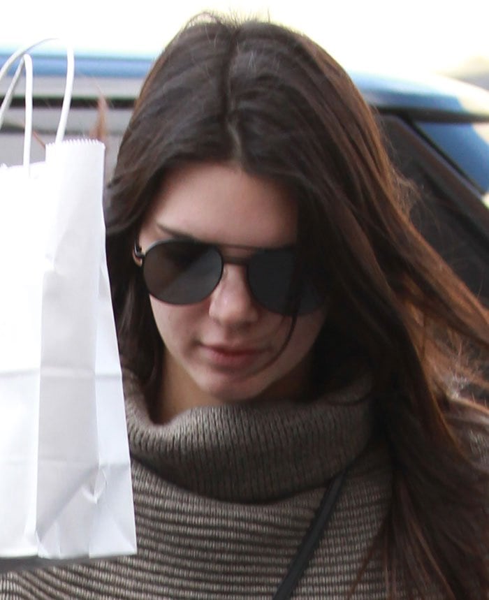 Kendall Jenner wears her hair down as she leaves Epione Skin Care