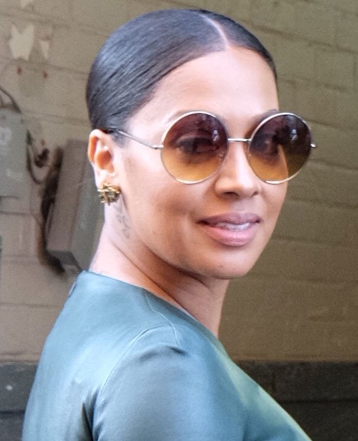 La La Anthony wears her hair back as she visits AOL Build in New York City