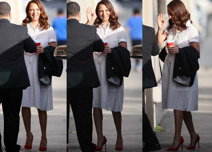 Maya Rudolph wears her hair down and juggles a blazer and a cup of coffee as she arrives at ABC Studios